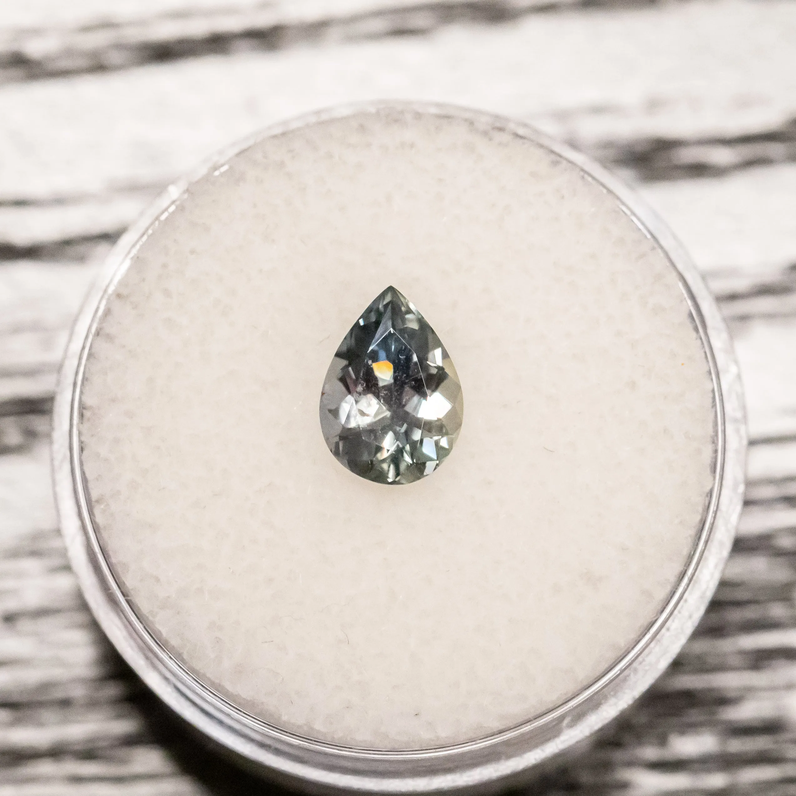 1.50CT PEAR MOZAMBIQUE SAPPHIRE, COLOR-SHIFTING MINTY GREEN TO TEAL BLUE GREY, 8.60x6.20x398MM, UNHEATED