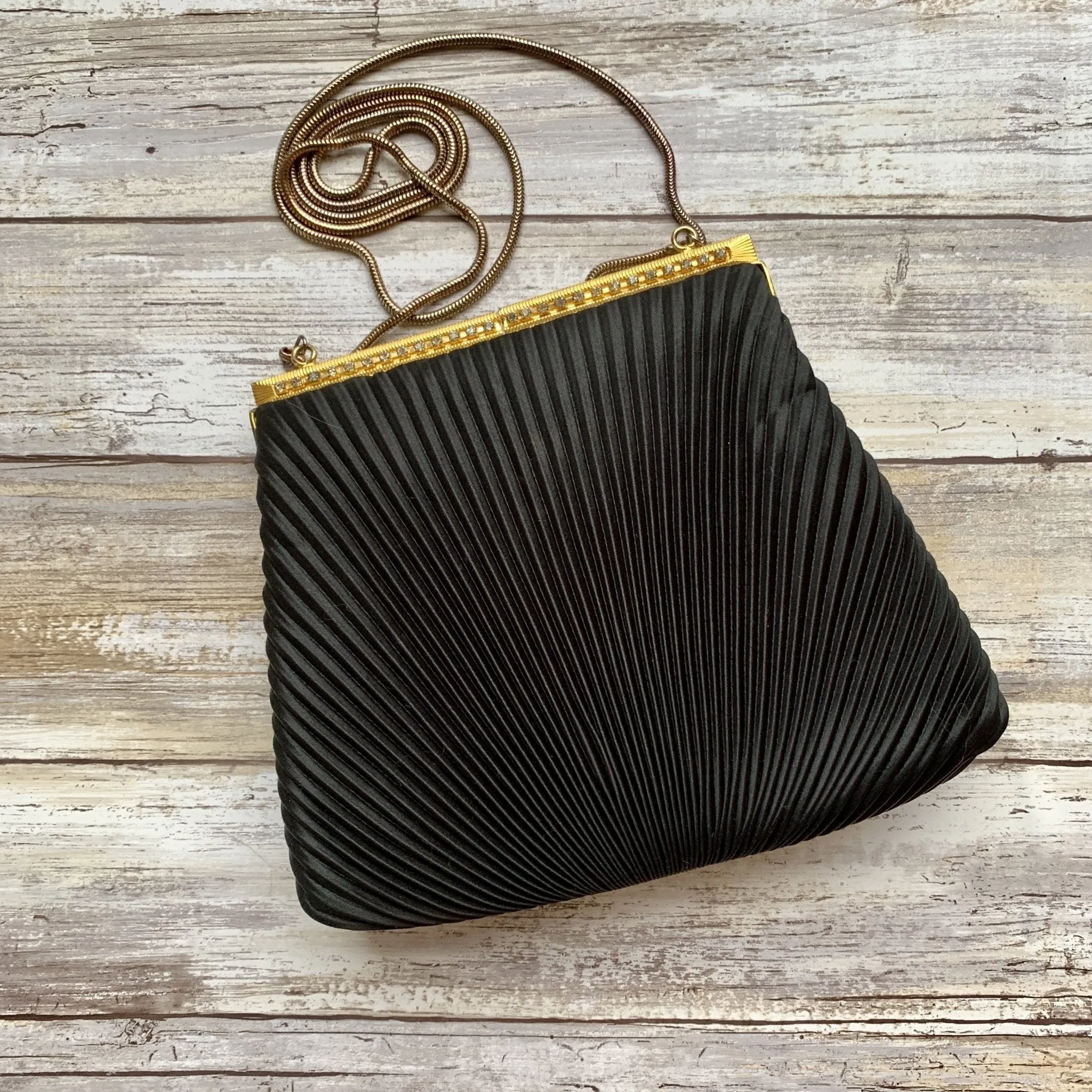 Vintage 1970s Little Black Handbag by La Regale. Black Micro Pleats with Rhinestone Kiss Closure.