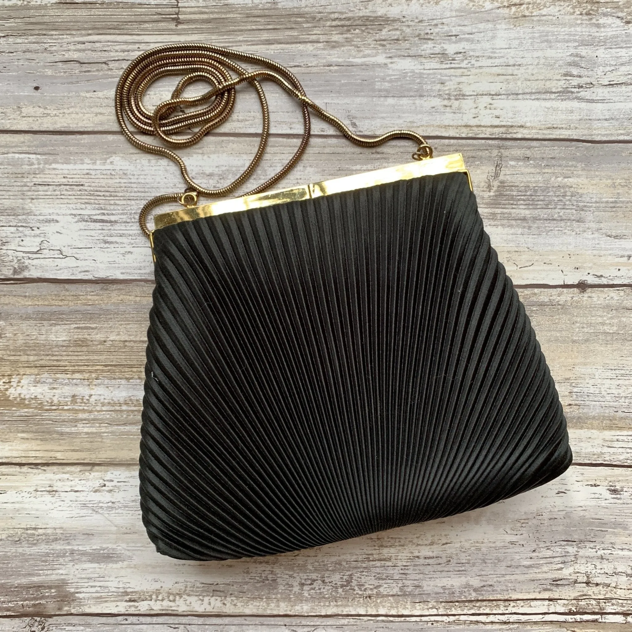 Vintage 1970s Little Black Handbag by La Regale. Black Micro Pleats with Rhinestone Kiss Closure.